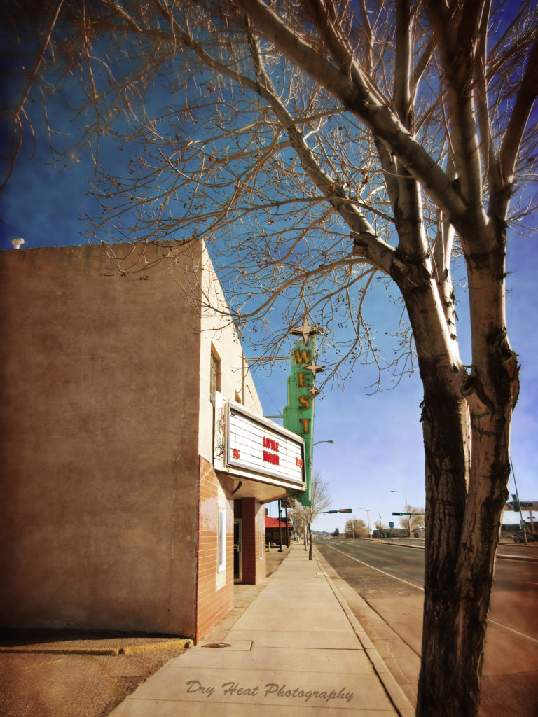 The West Theatre has a classic retro sign on Route 66 in Grants, New Mexico.