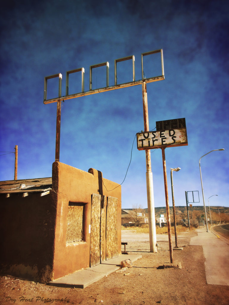 Abandoned auto-garage on Route 66 in Grants, New Mexico.