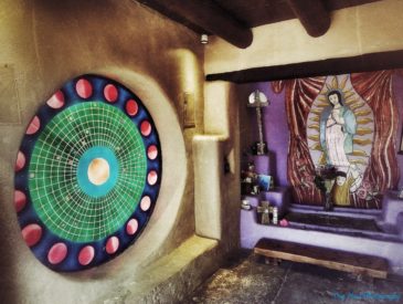 The Guadalupe Chapel in Old Town Albuquerque is famous for its round stained window depicting the phases of the moon.
