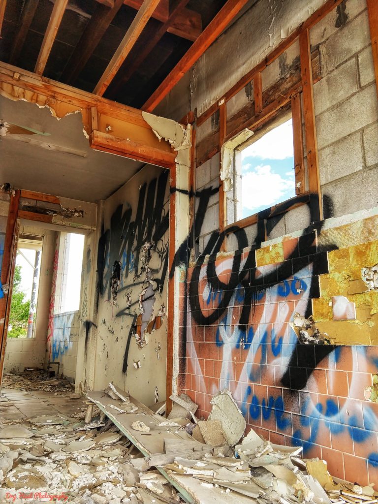 Tile from the bathroom wall inside the abandoned Whiting Bros Gas Station near Grants, New Mexico.