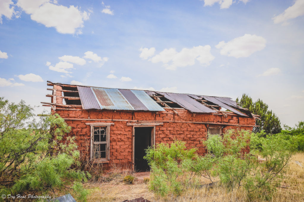 Abandoned adobe house in the Route 66 ghost town of Newkirk, New Mexico.