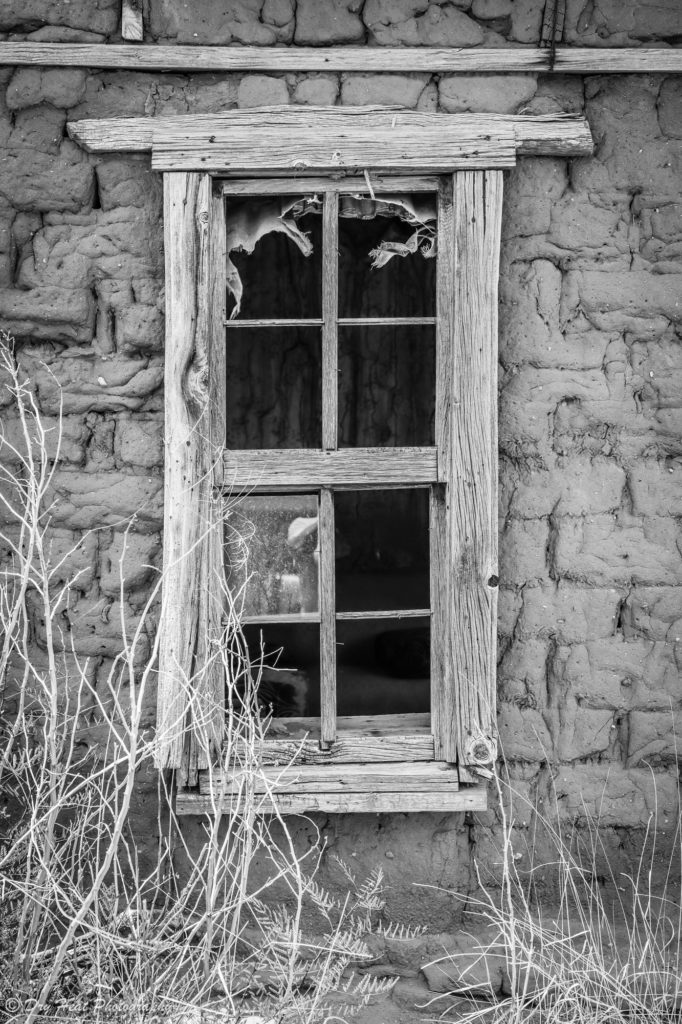 Abandoned adobe house in the Route 66 ghost town of Newkirk, New Mexico.