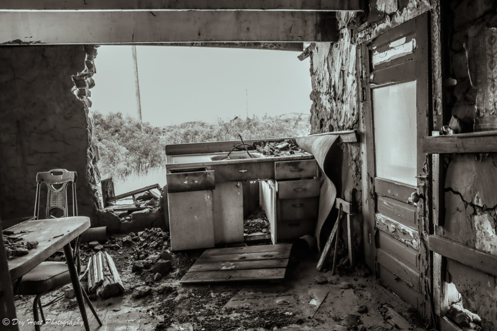 Abandoned adobe house in the Route 66 ghost town of Newkirk, New Mexico.
