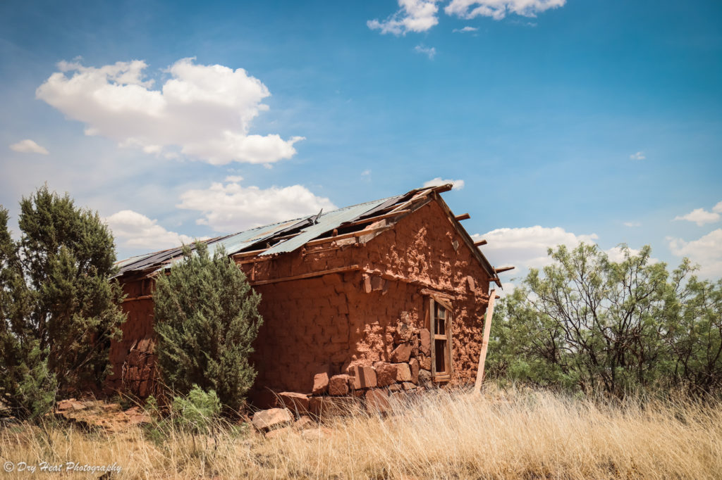 Abandoned adobe house in the Route 66 ghost town of Newkirk, New Mexico.