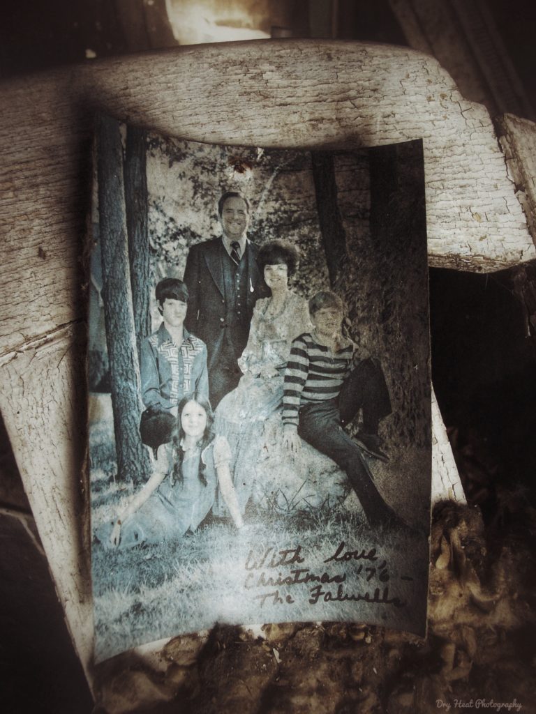 Jerry Falwell postcard nailed to a chair in an abandoned house in Navarino, Wisconsin.