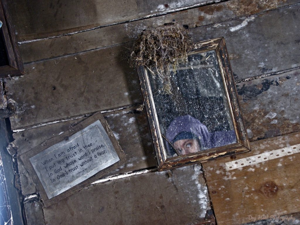 My reflection in the mirror inside an abandoned house in Navarino, Wisconsin.